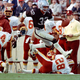 Marcus Allen soared over Washington to become one of the two youngest Super Bowl MVPs.